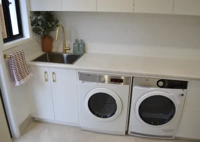 white laundry with washing machine